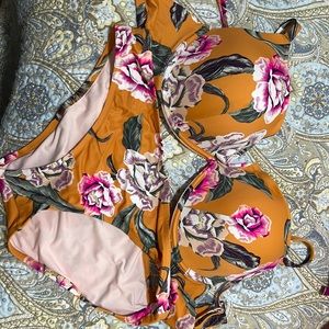 38DD and L shade and shore bikini. Underwire. Orange floral. New only tried on.